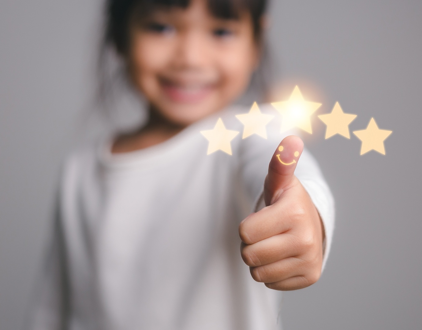 Cute,Little,Girl,Giving,Thumbs,Up,With,5,Stars,Approved